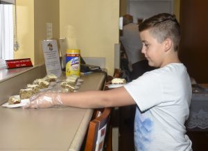 Tyrone United Methodist Church members serve dinner to Rosenbaum Family House guests